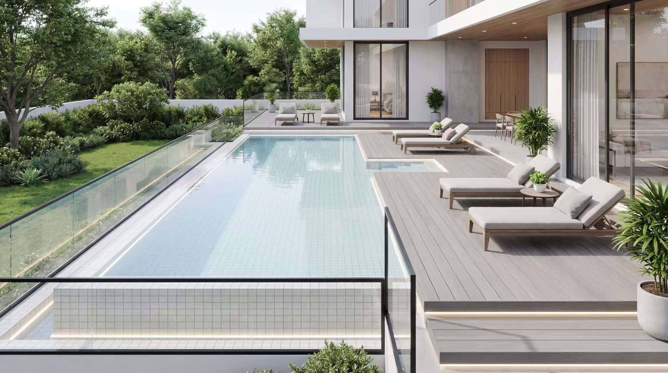 North Vancouver pool terrace: a long tiled pool along a timber deck with loungers and a glass balustrade, the residence's glazed elevation and garden beyond