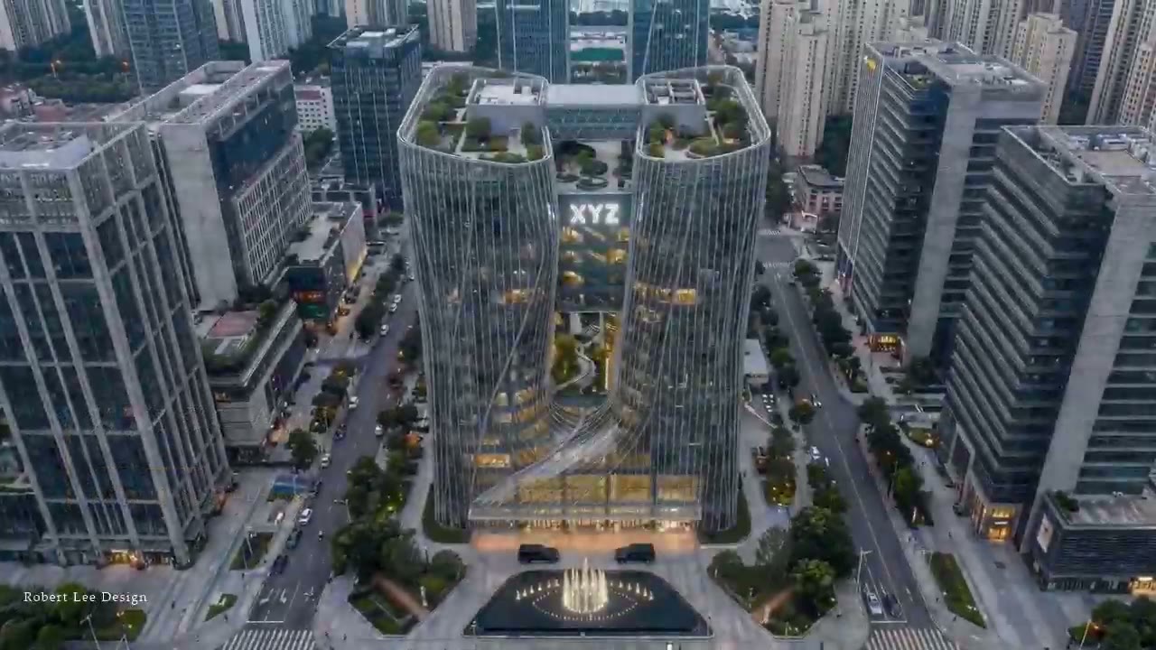XYZ TOWER aerial view at dusk: two twisting glass towers linked by sky bridges, the illuminated XYZ sign in the atrium between them and a fountain plaza at the base